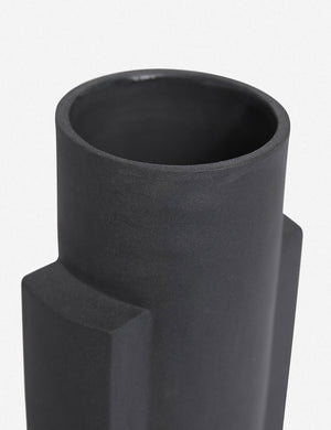Close-up of the Kala matte black geometric vase by light and ladder