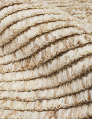 Close-up of the striped texture on the Kenzi sand rug