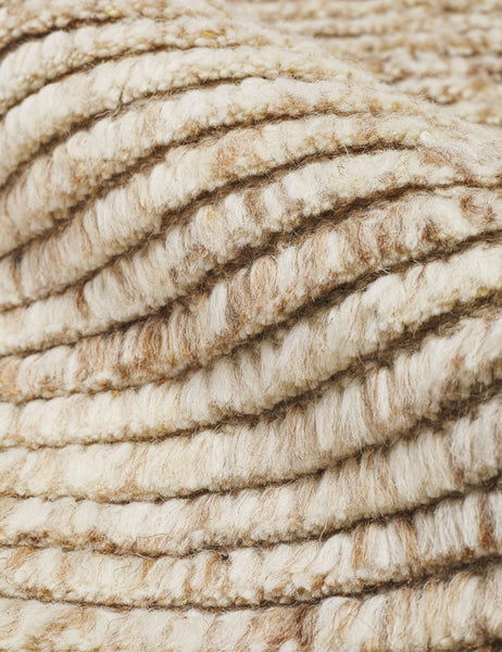 #size::6--x-9- #size::8--x-10- #size::9--x-12- #color::sand #size::10--x-14- | Close-up of the striped texture on the Kenzi sand rug