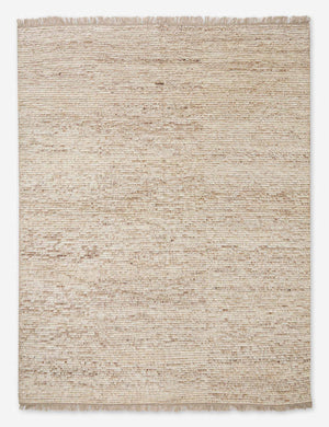 Kenzi sand rug with a striped texture and brown accent stripes