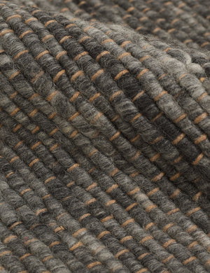 The handwoven all-natural fiber jute construction of the Khloe charcoal rug