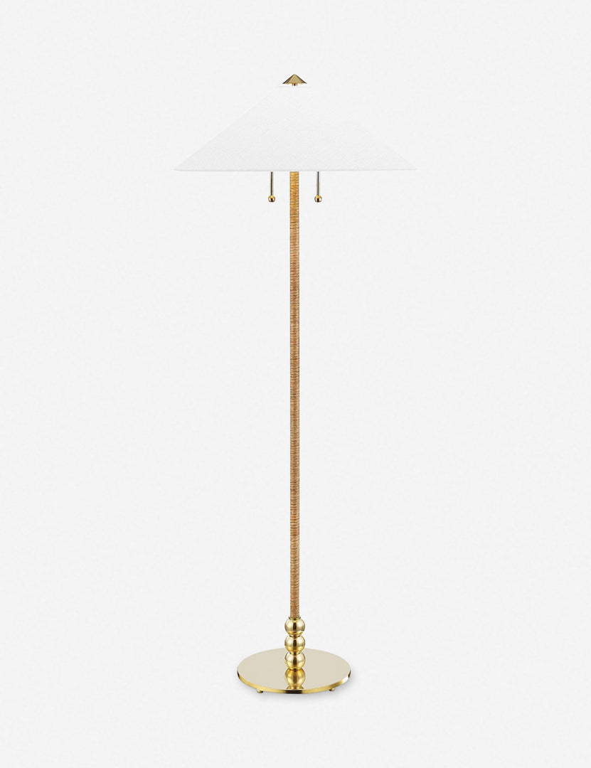 | Zora floor lamp with polished base and brass knob detailing