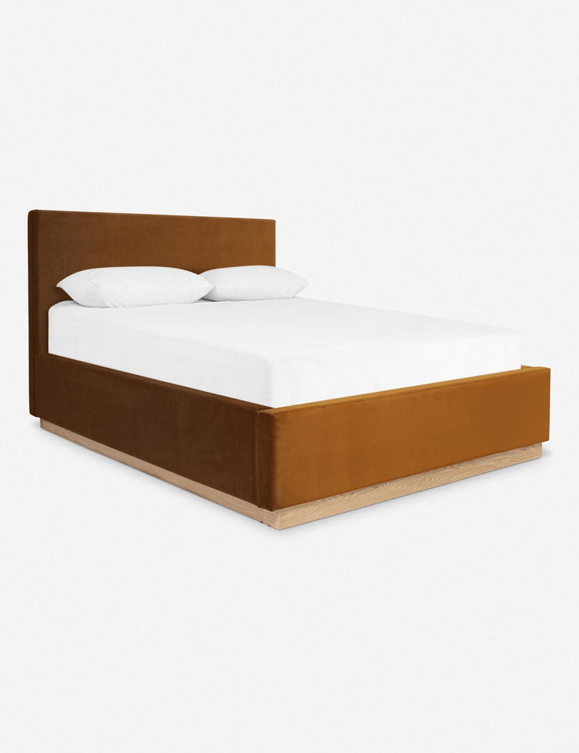 #color::cognac #size::cal-king #size::king #size::queen | An angled side view of the Lockwood cognac velvet-upholstered bed with a white oak base.