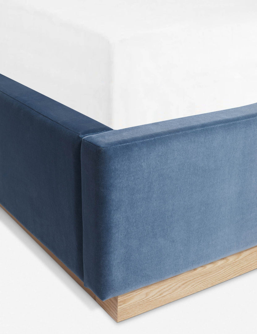 #color::harbor #size::cal-king #size::king #size::queen | Close-up of the blue velvet fabric and the white oak base on the Lockwood Bed by Ginny Macdonald.