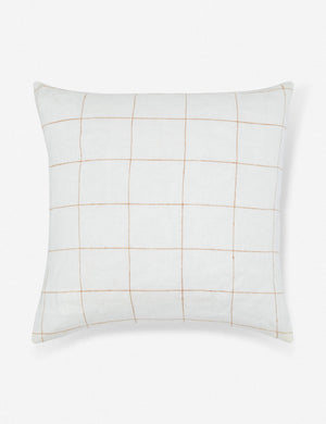 Lucian white linen square pillow with a rust orange gridded pattern