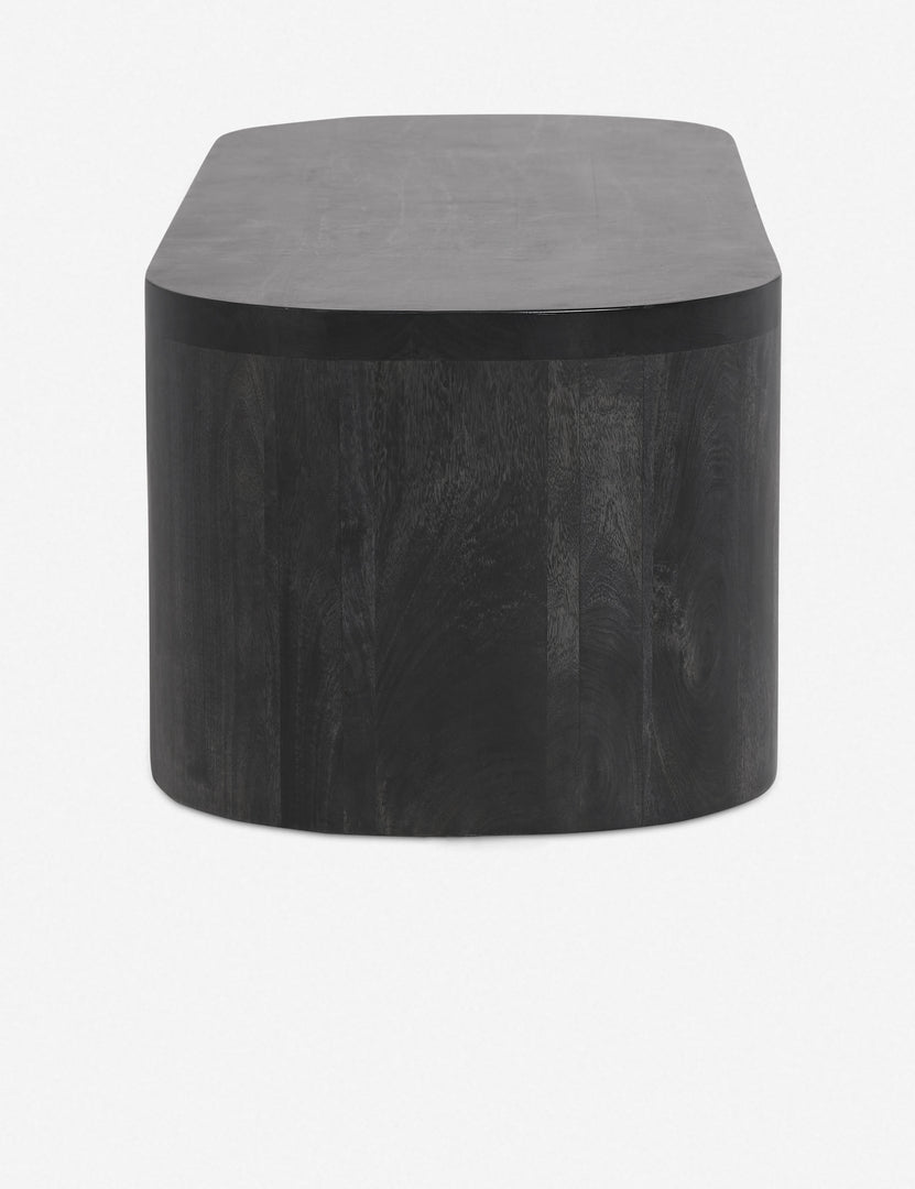 #color::black | Side view of the Luna black wood oval coffee table.