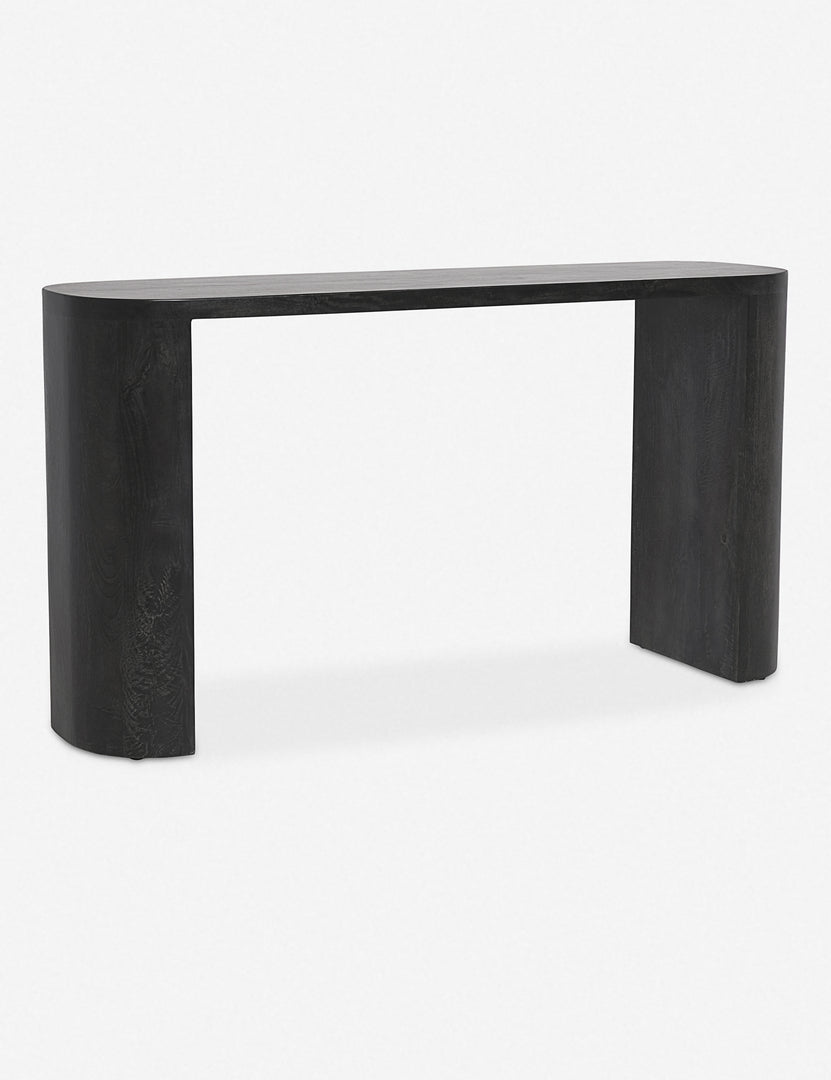 #color::black | Angled view of the Luna black mango wood oval console table.
