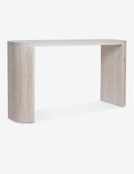 #color::washed-oak | Angled view of the Luna white-washed oak oval console table.