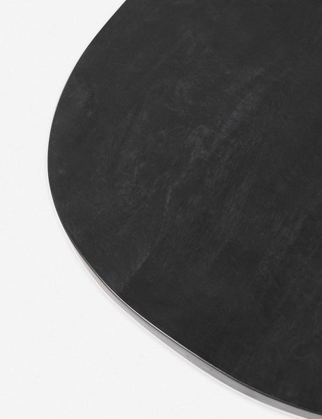 #color::black | The top of the Luna black wood round side table