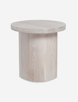 Close-up of the rim of the top of the Luna washed-oak wood round side table and the leg