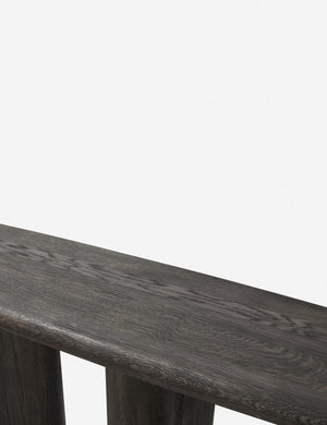 Close-up of the surface of the Nera black wood sculptural console table