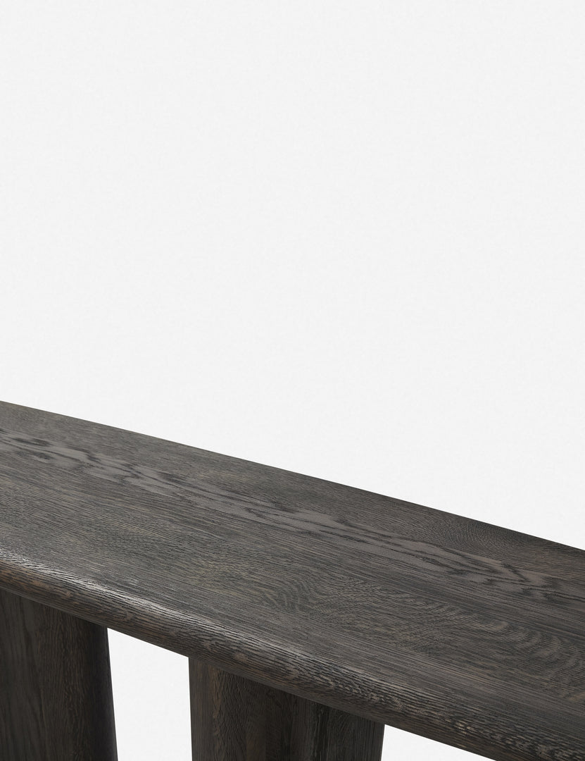 #color::black | Close-up of the surface of the Nera black wood sculptural console table