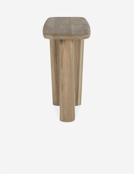 #color::natural | Side view of the Nera natural wood sculptural console table