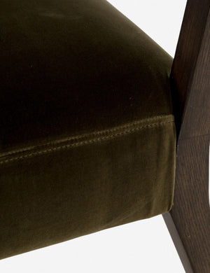 Close-up of the stitch work and olive velvet fabric on the Lyssa olive velvet accent chair