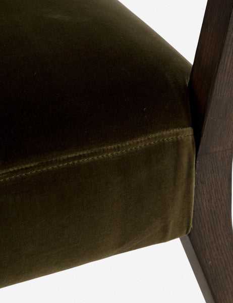 | Close-up of the stitch work and olive velvet fabric on the Lyssa olive velvet accent chair