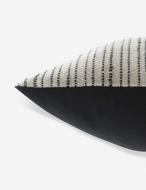 Side view of the Peregrine black and white marled striped lumbar pillow