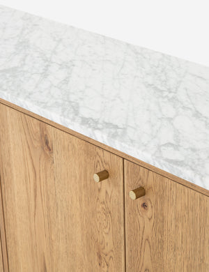 The marble top and doors of the Melysa Sideboard