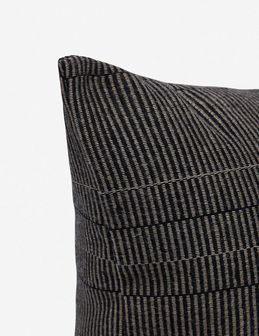 #color::black #style::square | Corner shot of the Milan indoor and outdoor pillow by Sunbrella