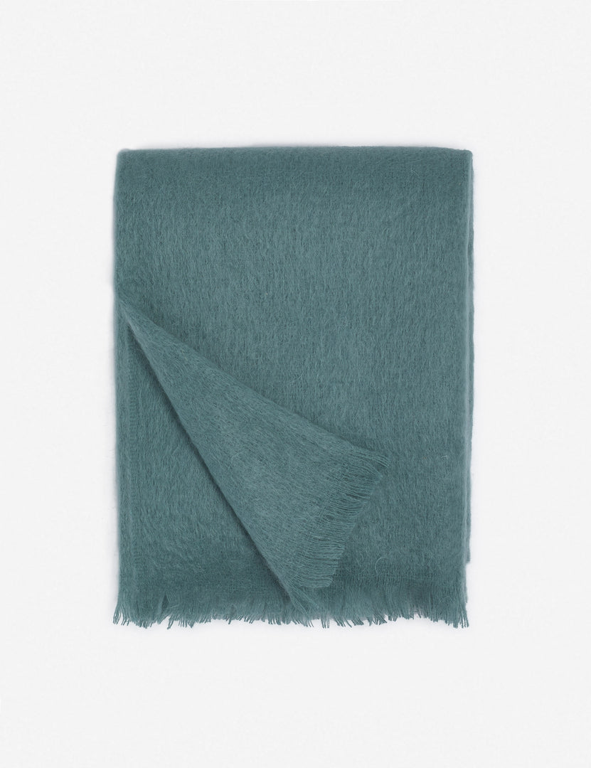 #color::blue | Aimee mohair blue wool throw blanket with fringe ends with the corner folded in