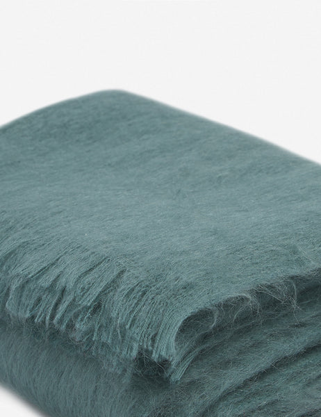 #color::blue | Close-up of the Aimee mohair blue wool throw blanket with fringe ends