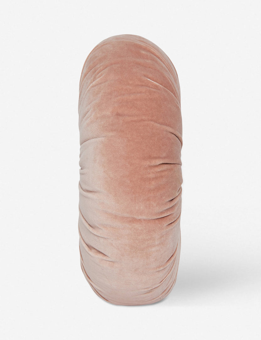 #color::rosewater | Side view of the Monroe rosewater pink velvet round pillow 
