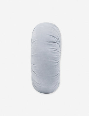 Side view of the Monroe ice blue velvet round pillow