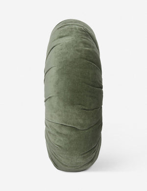 Side view of the Monroe moss green velvet round pillow