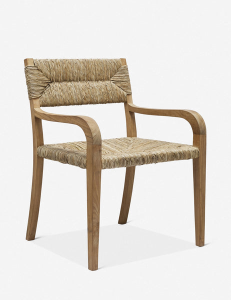 | Angled view of the Nolani woven rattan arm chair