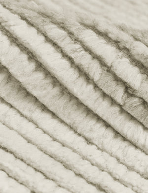 Close-up of the two-toned ribbed fabric on the Nomad neutral-toned geometric floor rug by Élan Byrd