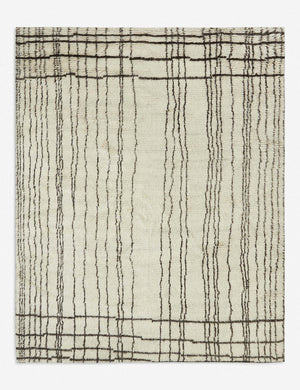 Nora sustainable ivory moroccan rug with a brown striped pattern