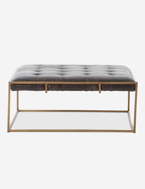 Olwina Square Black Leather Coffee Table with a tufted finish and a brass-tone metal frame