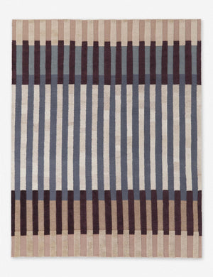 Otti prismatic wool-cotton rug with a blue, maroon, and ivory abstract linear design by Nina Freudenberger