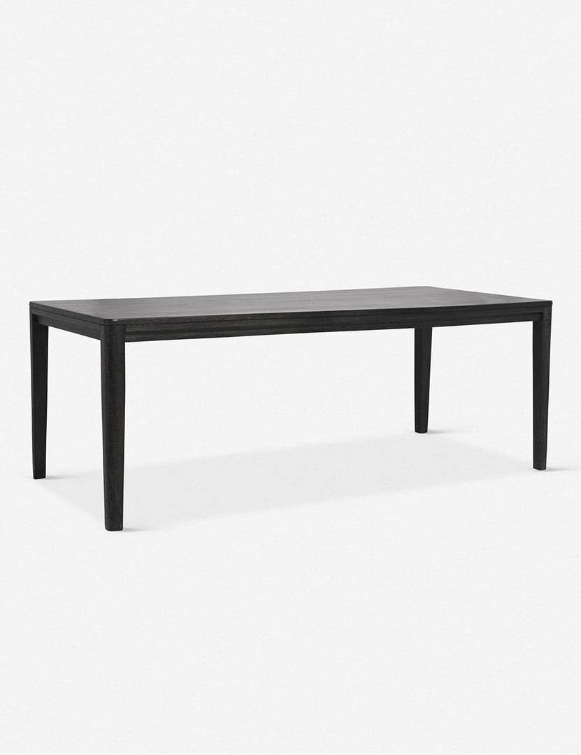 #color::black #size::82-W | Angled view of the Reese black mango wood rectangular dining table.