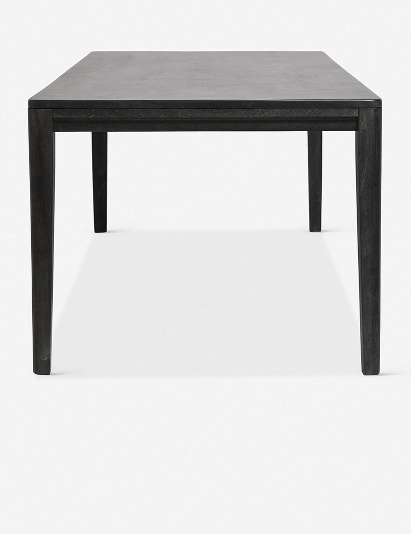 #color::black #size::82-W | Side view of the Reese black mango wood rectangular dining table.