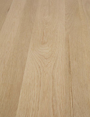 Detailed view of the oak wood on the Reese oak wood rectangular dining table.