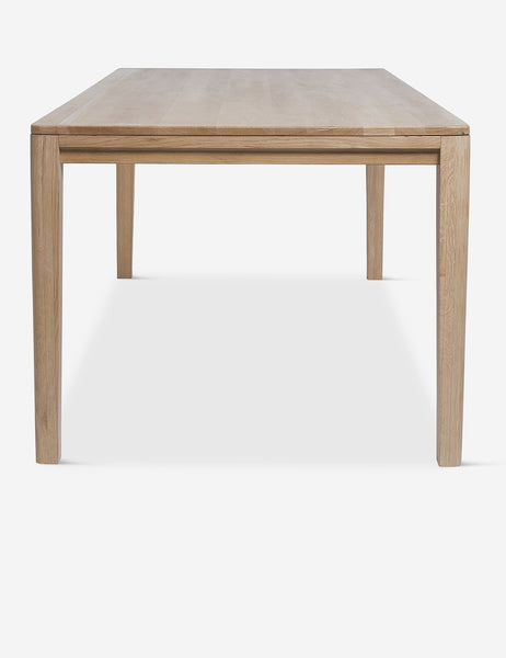 #color::oak #size::82-W | Side view of the Reese oak wood rectangular dining table.