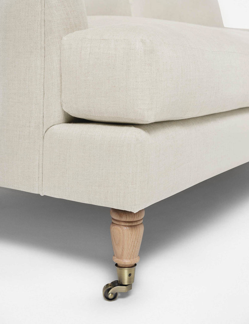 #size::72-W #size:84-W #color::natural #size::96-W | Wheeled legs on the Rivington Natural Linen sofa