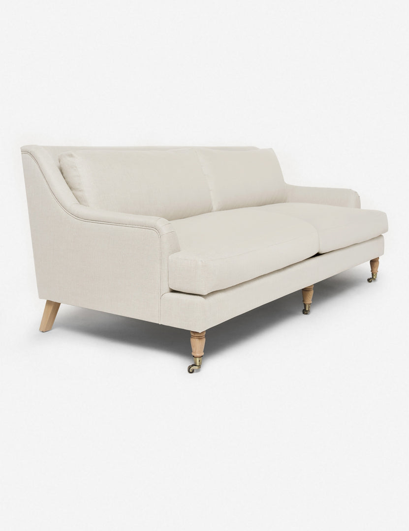 #size::72-W #size:84-W #color::natural #size::96-W | Angled view of the Rivington Natural Linen sofa