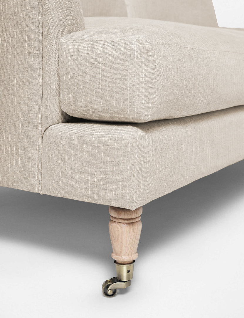#size::72-W #size:84-W #color::stripe #size::96-W | Wheeled legs on the Rivington Stripe Linen sofa