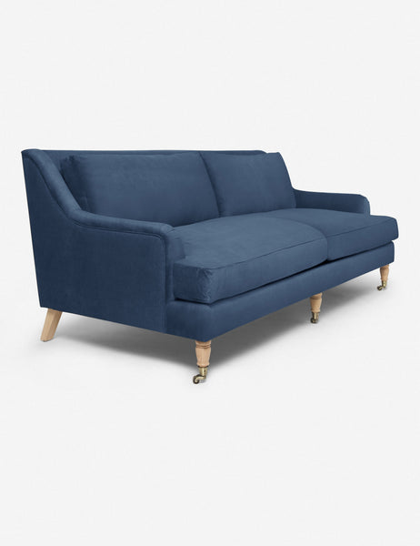#size::72-W #size:84-W #color::harbor #size::96-W | Angled view of the Rivington Harbor Blue Velvet sofa