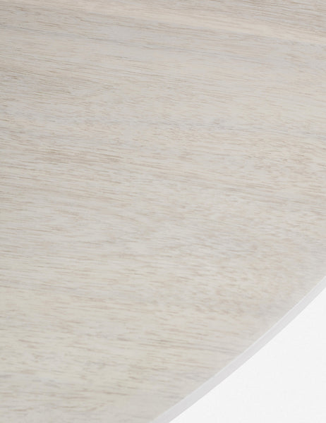 #color::white-wash | Close-up of the white-washed acacia wood on the Rutherford round dining table with pedestal base.