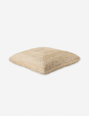 Angled view of the Candess ivory bohemian style jute Floor Pillow