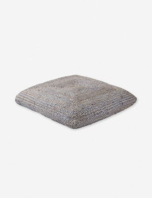 Angled view of the Candess light gray bohemian style jute Floor Pillow