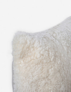 Close-up of the left corner on the Samaire shearling white plush lumbar pillow