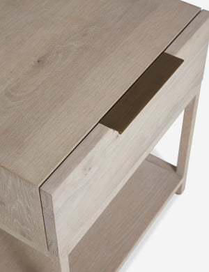Upper view of the top and iron drawer pull on the Dana Natural Wood Nightstand