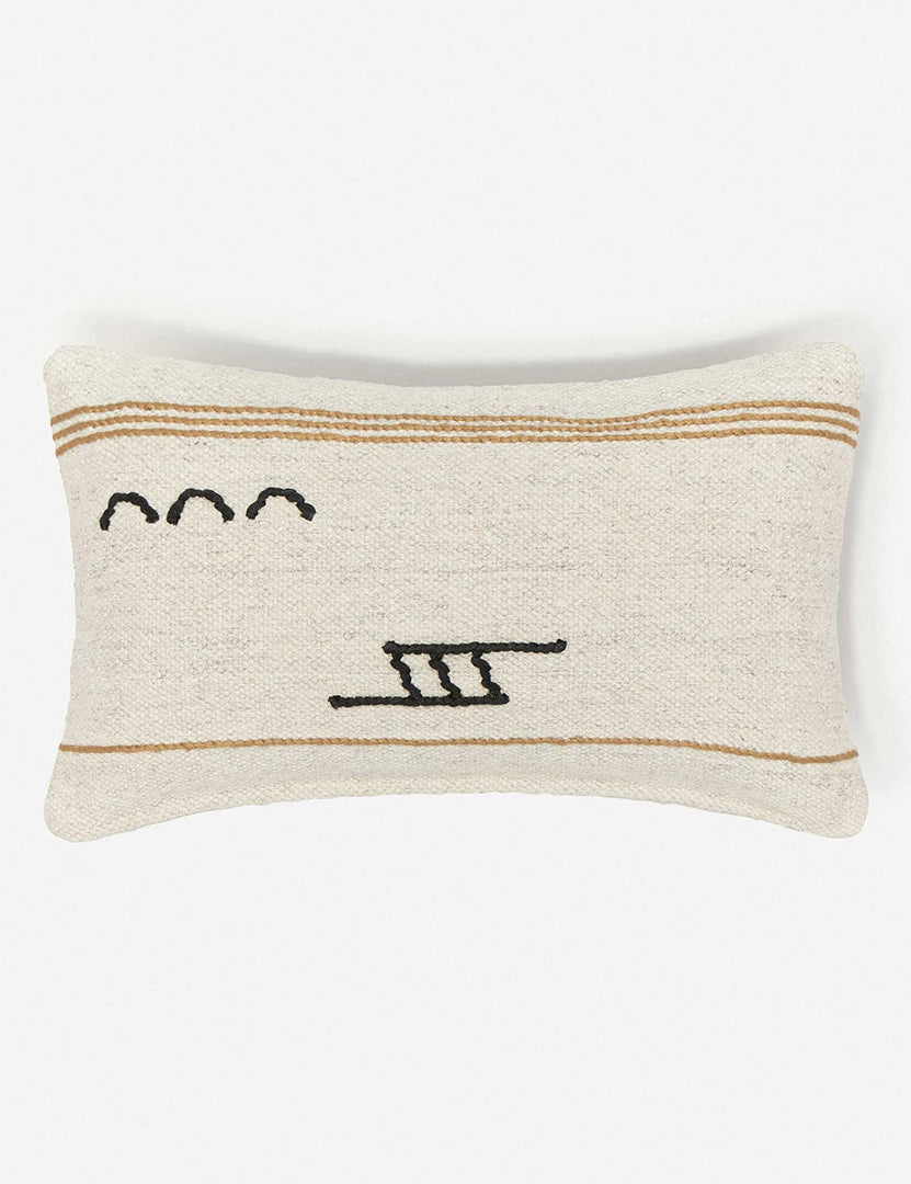 #style::lumbar | Iconic ivory stripe lumbar pillow with orange stripes and black symbols by Sarah Sherman Samuel
