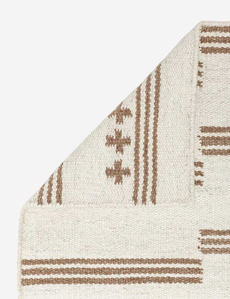 #size::2--x-3- #size::2-6--x-8- #size::3--x-5- #size::5--x-8- #size::8--x-10- #size::9--x-12- #size::10--x-14- #size::12--x-15- | Close-up of the folder corner on the Stripe break flatweave rug by Sarah Sherman Samuel
