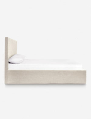 Side of the Paxton natural linen slipcover bed