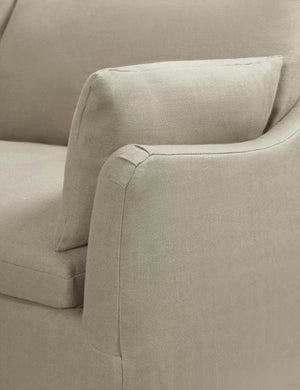 Close-up of the sloped-arm on the Portola Flax linen Slipcover corner sectional Sofa