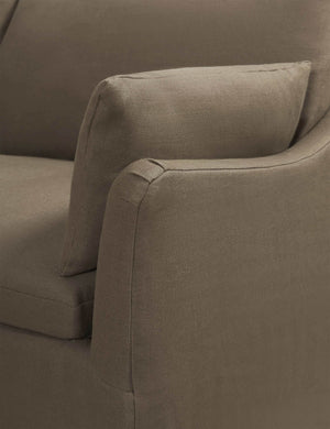 Close-up of the sloped-arm on the Portola Mushroom brown linen Slipcover corner sectional Sofa